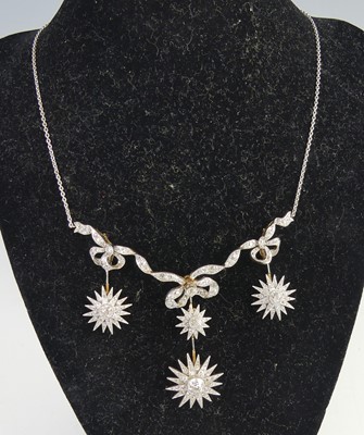 Lot 2130 - A yellow and white metal diamond articulated...