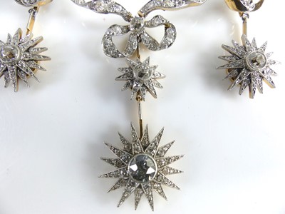 Lot 2130 - A yellow and white metal diamond articulated...