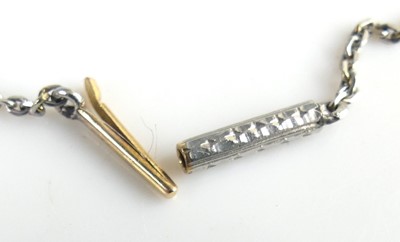 Lot 2130 - A yellow and white metal diamond articulated...