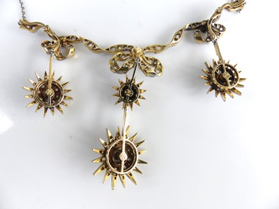 Lot 2130 - A yellow and white metal diamond articulated...