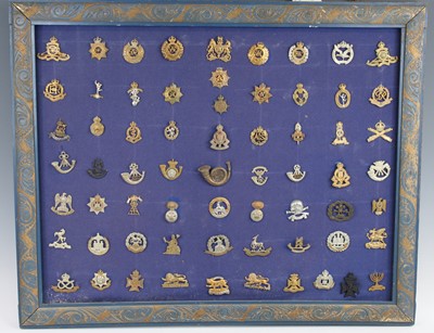 Lot 3400 - A collection of assorted cap badges and...