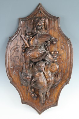 Lot 3517 - A late 19th century black forest style carved...
