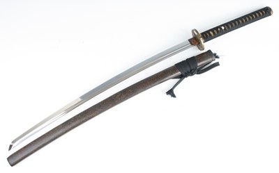Lot 3335 - A Japanese Katana, the 72cm curved steel blade...