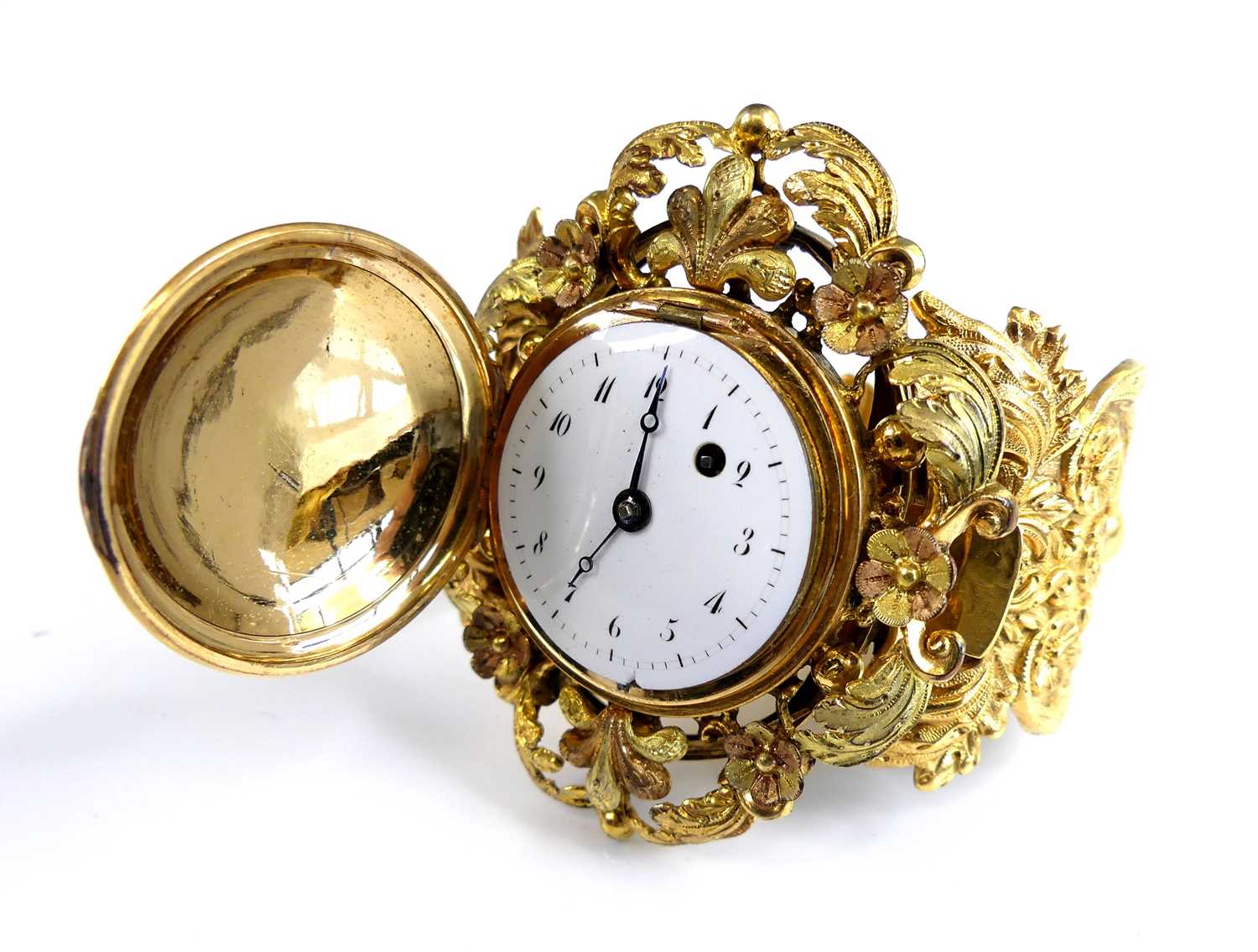 Lot 2134 - A Victorian pinchbeck bracelet / bangle watch,...
