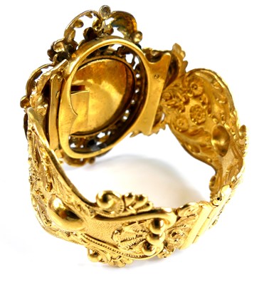 Lot 2134 - A Victorian pinchbeck bracelet / bangle watch,...
