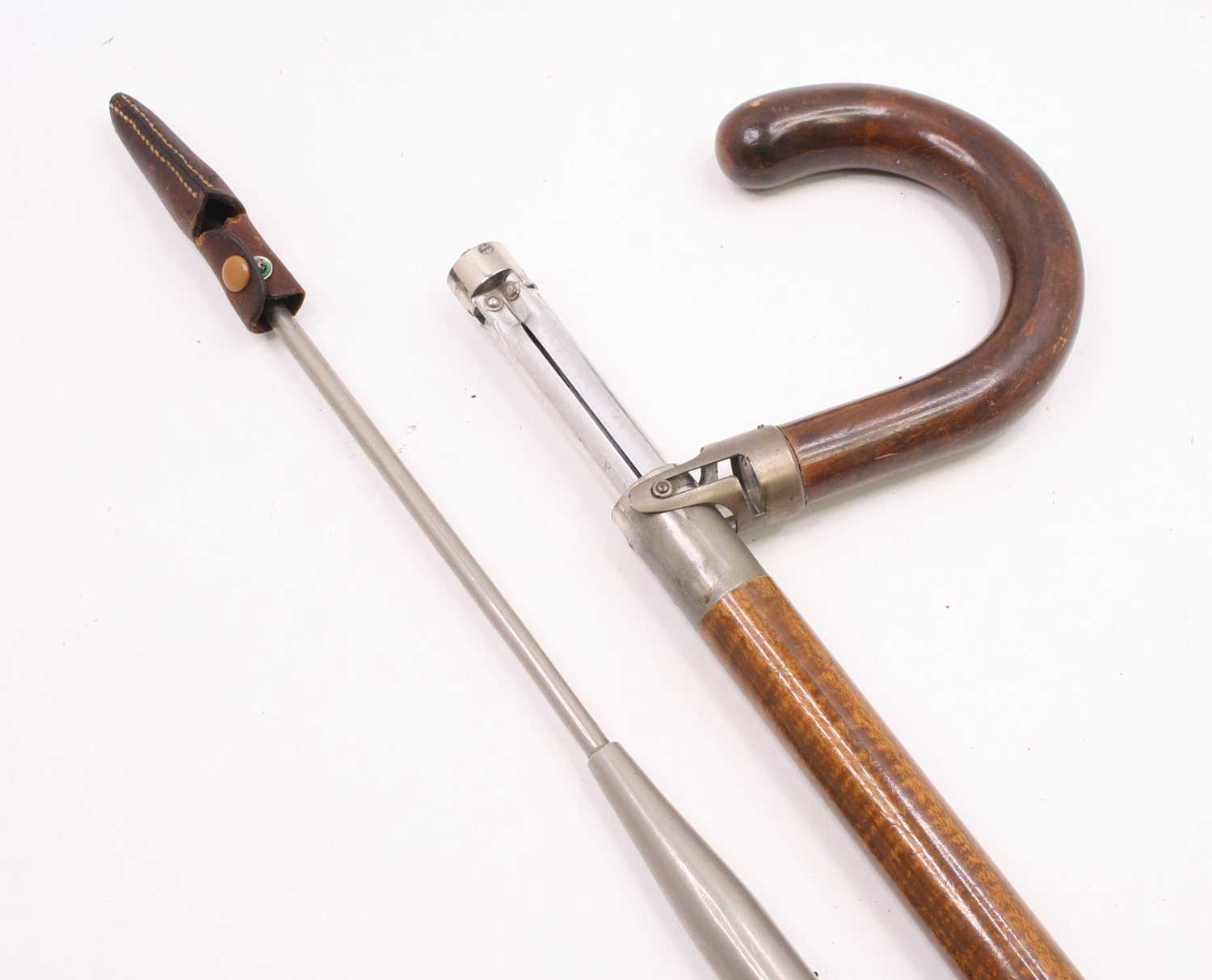 Lot 3537 - An early 20th century German tripod cane, the...