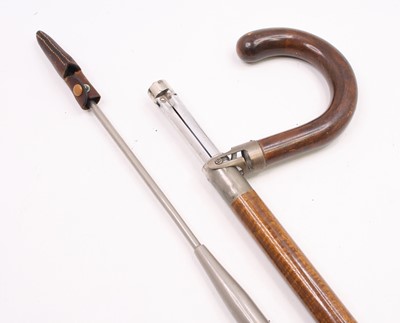 Lot 3537 - An early 20th century German tripod cane, the...