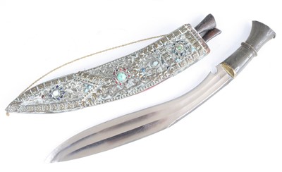 Lot 3439 - A ceremonial kukri, having a 33cm curved steel...