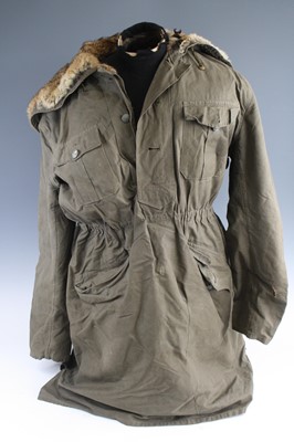 Lot 3455 - A German Third Reich Winter parka, in field...