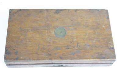 Lot 3530 - An early 20th century oak gun case, the hinged...