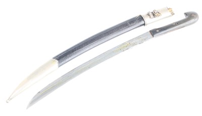 Lot 3447 - An Eastern dagger, having a 30cm curved steel...