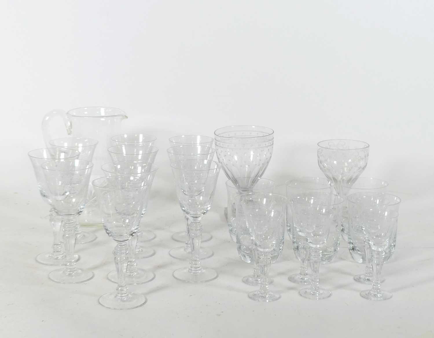 Lot 140 - A suite of Czech drinking glasses, each with...