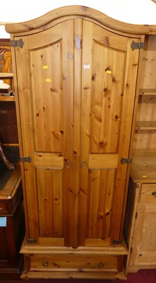Lot 1374 - A modern pine double door wardrobe, width 79cm