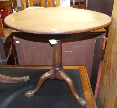 Lot 1375 - A George III mahogany circular tilt-top...