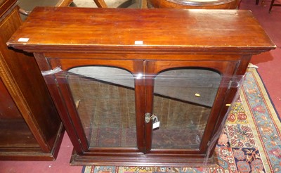 Lot 1382 - A 19th century mahogany double door glazed...