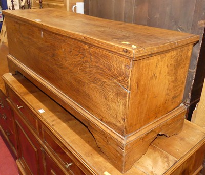Lot 1390 - An 18th century provincial elm long hinge top...