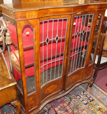 Lot 1402 - An Edwardian walnut and twin door lead glazed...