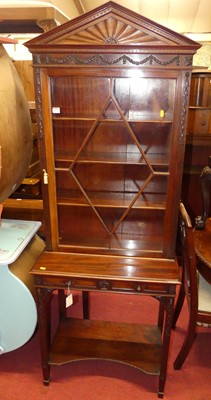 Lot 1407 - An Edwardian mahogany cabinet on stand, of...