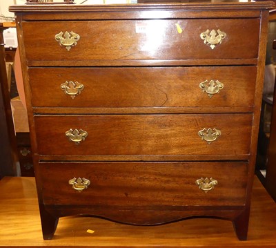 Lot 1411 - A 19th century mahogany low chest of four long...
