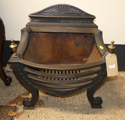 Lot 1421 - A cast iron fire basket in the classical taste,...