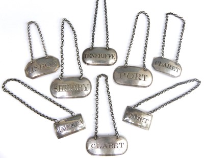Lot 2101 - A group of eight mostly George III silver...