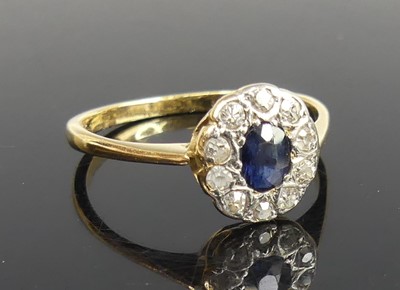 Lot 2252 - A yellow and white metal, sapphire and diamond...