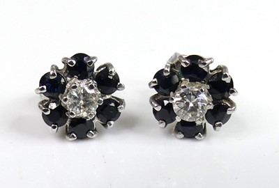 Lot 2251 - A pair of 9ct white gold, sapphire and diamond...