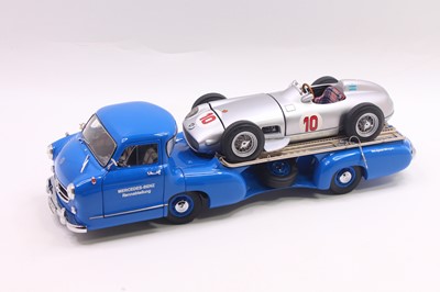 Lot 2047 - CMC 1/18 scale car transporter and car group...