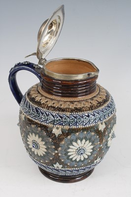 Lot 2058 - A Doulton Lambeth stoneware jug, having a...