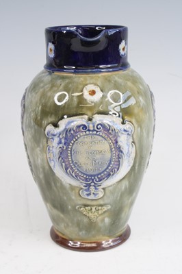 Lot 2074 - A Royal Doulton stoneware jug to commemorate...