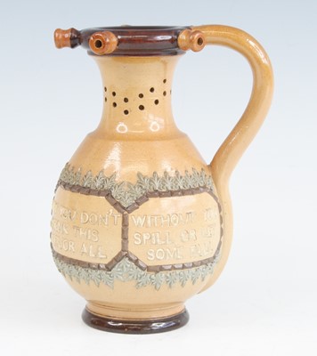 Lot 2065 - A Doulton Lambeth stoneware puzzle jug, the...