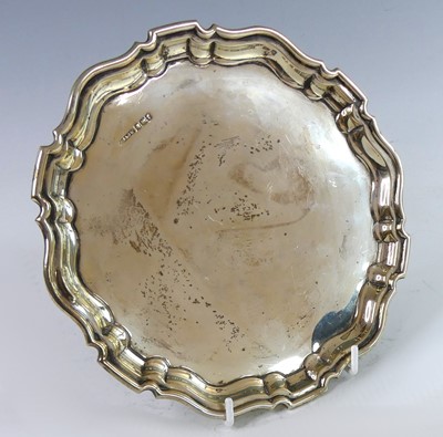 Lot 2196 - A George silver card waiter, of shaped...