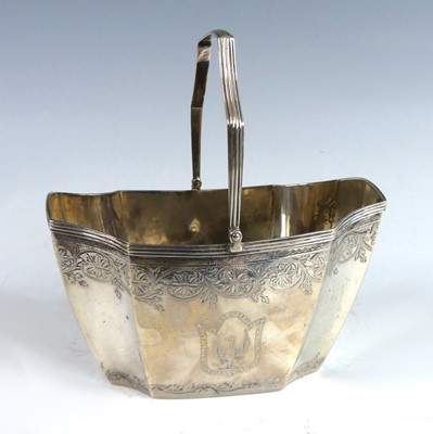 Lot 2164 - A George III silver swing handled sugar basket,...