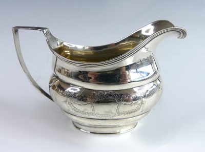 Lot 2116 - A George III silver sauceboat, of helmet form...