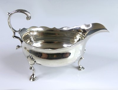 Lot 2115 - A George III silver sauceboat, of oval bellied...