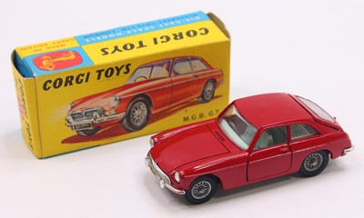 Lot 1594 - Corgi Toys No. 327 M.G.B GT in red with wire...