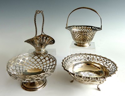 Lot 252 - Four 20th century pierced silver bonbon dishes,...