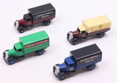 Lot 1252 - Dinky Toys group of four No. 25 covered wagons...