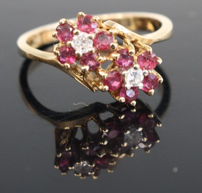 Lot 304 - A yellow and white metal, ruby and diamond...