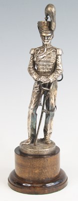 Lot 773 - A 20th century white metal figure of a Hussar,...
