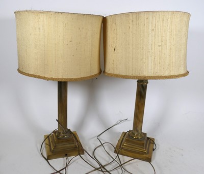 Lot 15 - A pair of brass Corinthian column table lamps,...