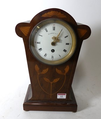 Lot 12 - An Art Nouveau walnut and floral marquetry...