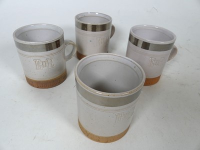 Lot 27 - A set of four Robin Welch pottery Silver...