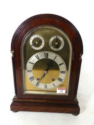 Lot 33 - An early 20th century cased mantel clock, of...