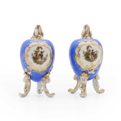 Lot 52 - A pair of German porcelain urns and covers,...