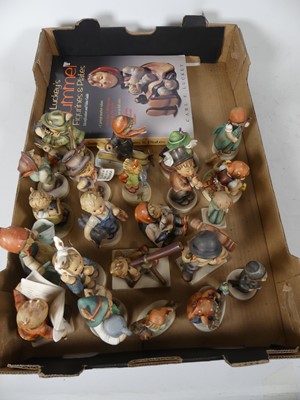 Lot 65 - A collection of Hummel figures, together with...