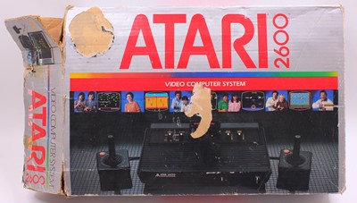 Lot 986 - Atari 2600 Video computer system containing...