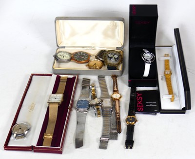 Lot 421 - A box of fashion watches to include a boxed...