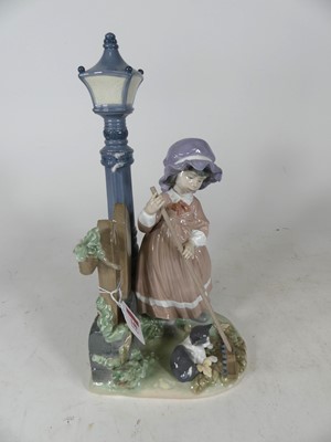Lot 140 - A Lladro porcelain figure group 'Fall Clean-Up'...