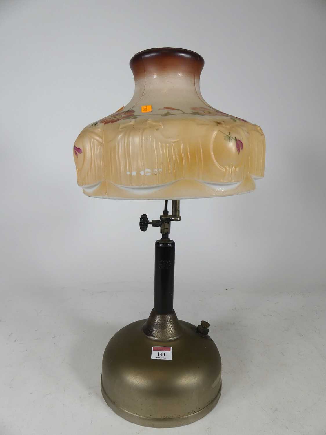Lot 141 - A Coleman Quick-lite table lamp, having a...